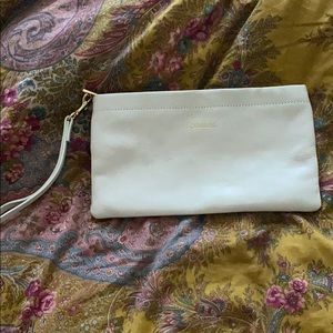 Boulevard Cream leather feminist clutch